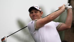  Stephen Gallacher of Scotland shot a -under  on Saturday to take a three-shot lead at the Dubai Desert Classic and break a three-round scoring record set by Tiger Woods  years ago.